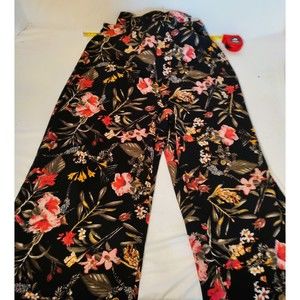 Flowered Pants Suit Size Medium, open sided.